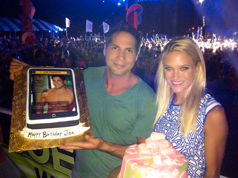 Joe Francis and Abbey Wilson holding their personalized birthday cakes